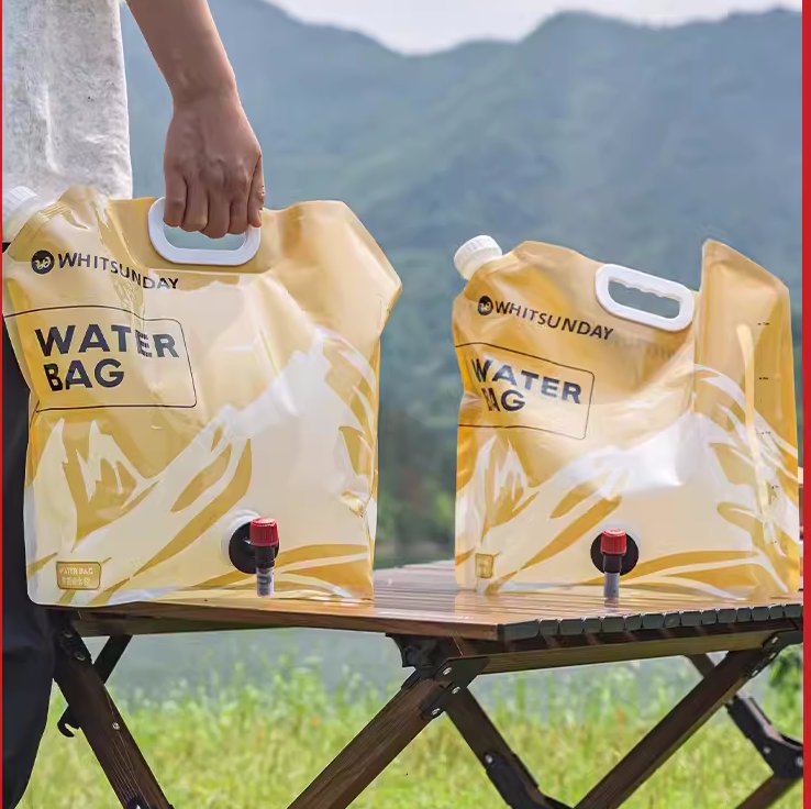 Expedition Water Bag, two sizes, set up at a camp table